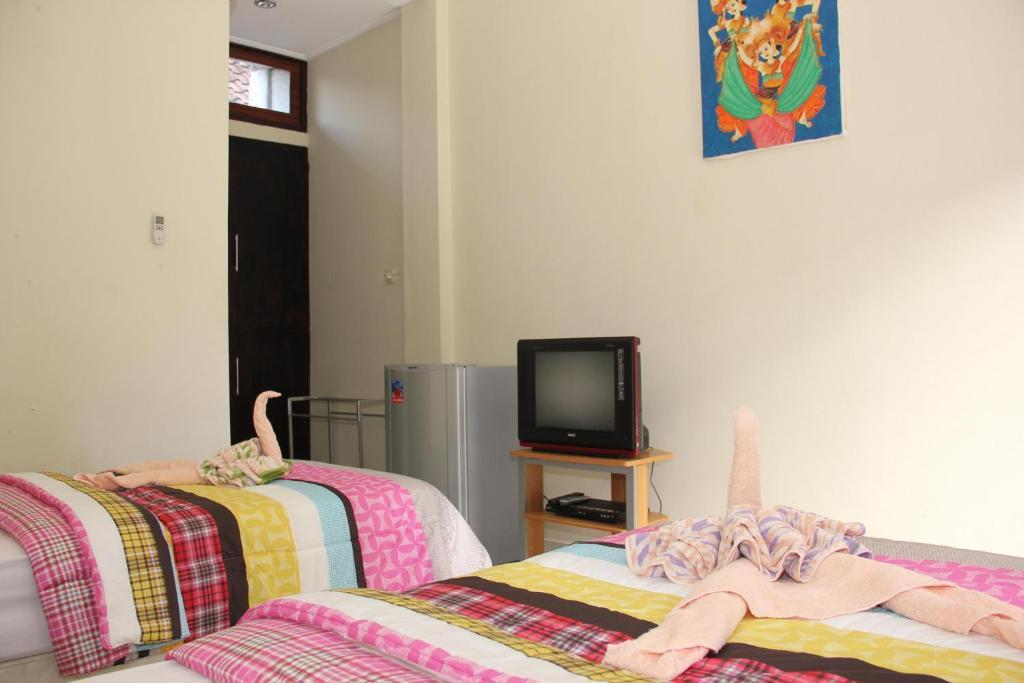 Апартаменты Warung Coco Poppies 2 Кута Номер фото